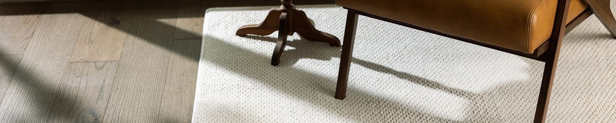 Chair and table on rug - Taylorville Home Source in Taylorville